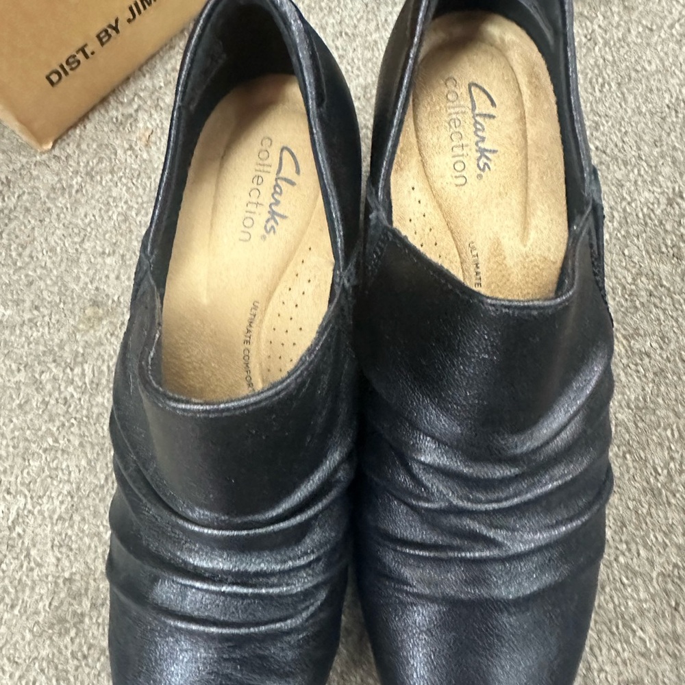 Black clarks slip ons size 9